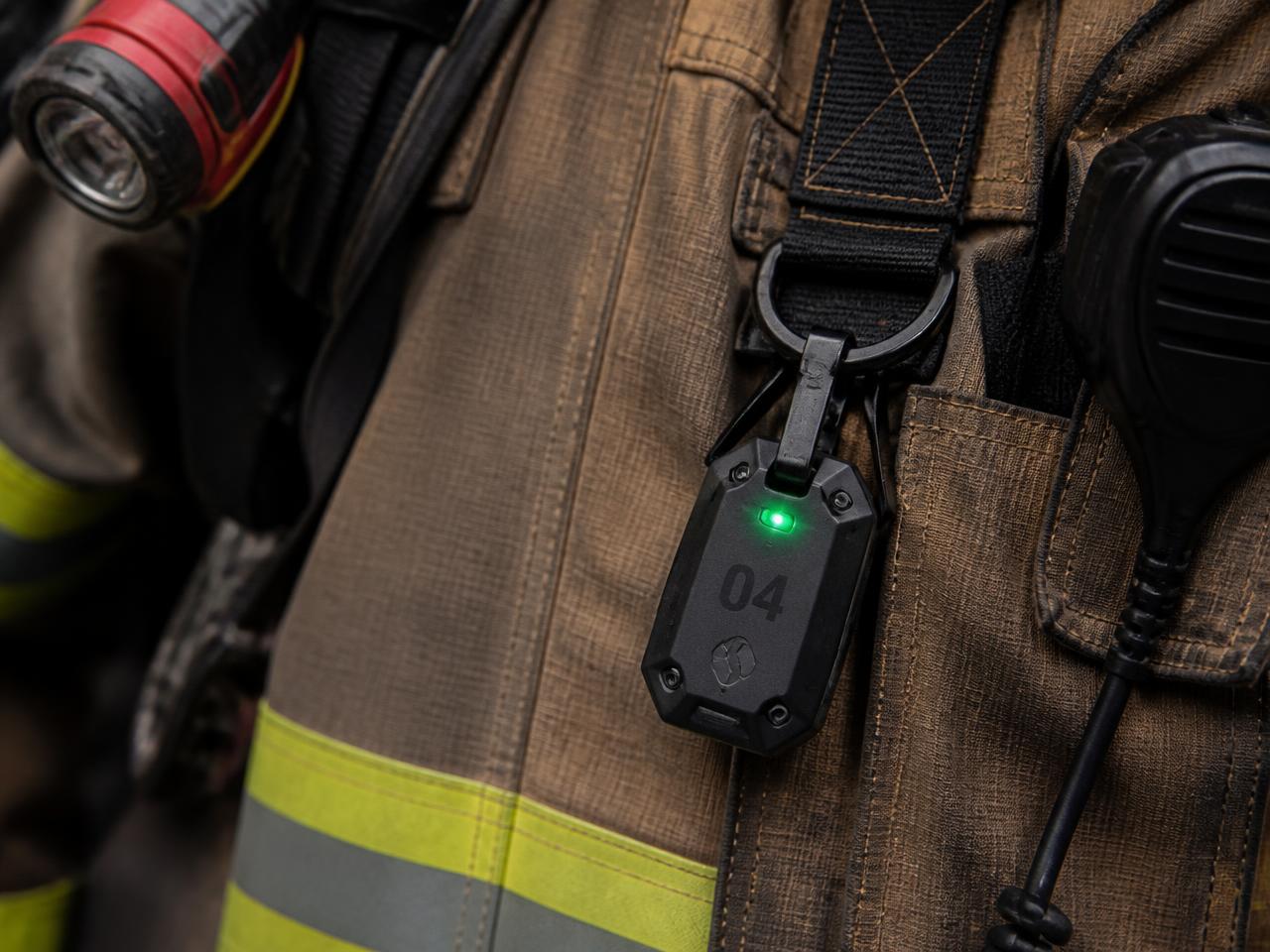 Small responder-worn identification tag clipped to turnout gear